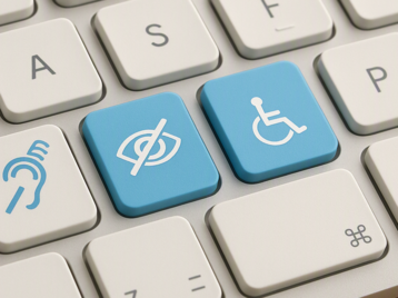 Tastatur mit drei blauen Tasten, die Symbole für Hörbehinderung, Sehbehinderung und Rollstuhlnutzung zeigen