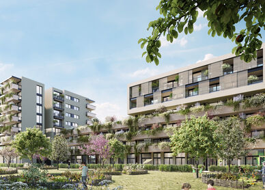 mehrstöckige moderne Wohngebäude mit begrünten Fassaden und Gartenanlage im Vordergrund unter blauem Himmel