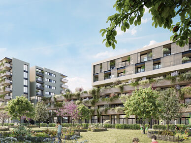 mehrstöckige moderne Wohngebäude mit begrünten Fassaden und Gartenanlage im Vordergrund unter blauem Himmel